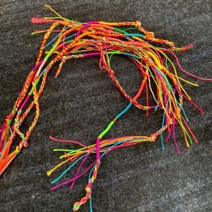 Silk rope bracelet. It’s a lot and brand new all